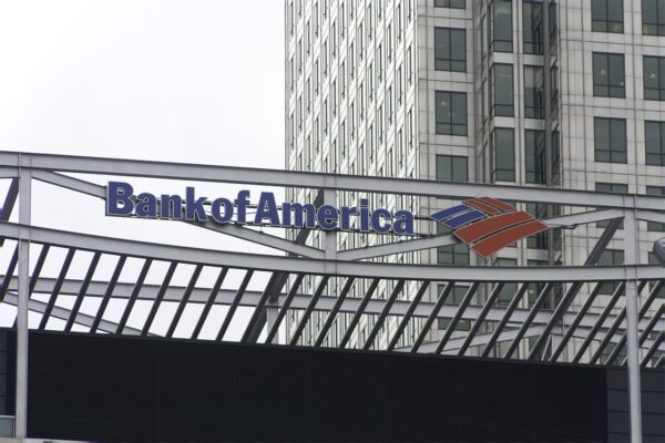 Close-up of Bank of America logo on a building exterior, representing the financial institution involved in the $72.5 million settlement with Jeffrey Epstein victims.