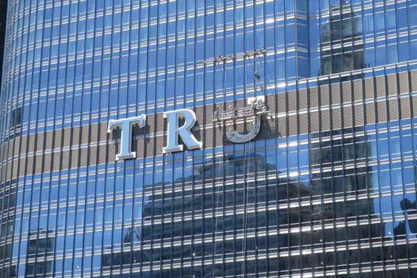 Close-up of the Trump name on Trump Tower in Chicago, illustrating Trump’s branding amid rising oil prices