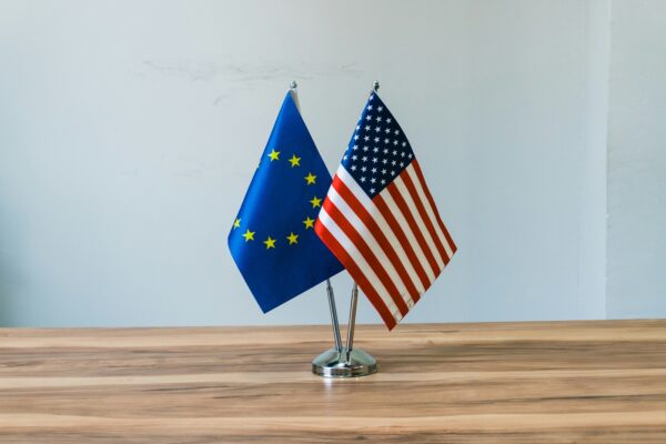 EU and US flags side by side, symbolizing transatlantic relations and global security concerns