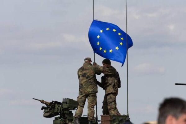 European Union flag with military elements symbolizing Europe’s defence readiness 2030 strategy