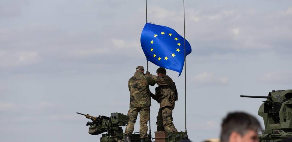 European Union flag with military elements symbolizing Europe’s defence readiness 2030 strategy