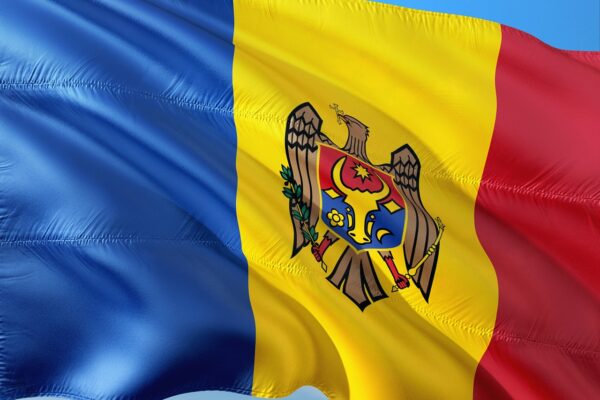 Flag of Moldova waving against the sky, symbolizing the country during the ongoing energy crisis linked to Russian attacks on Ukraine