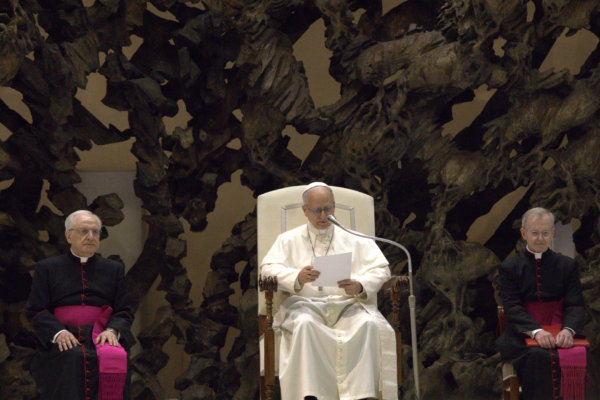 Pope Leo XIV addressing a congregation, pope calling for peace