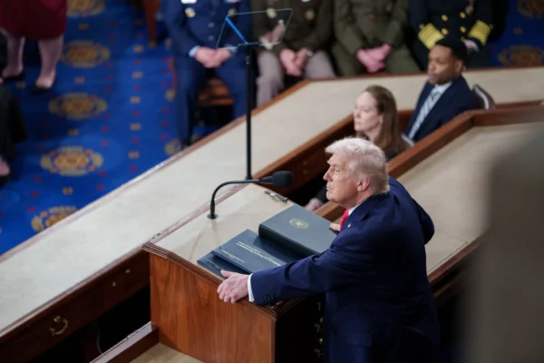 Donald Trump speaking at a podium addressing the nation on Iran conflict 2026