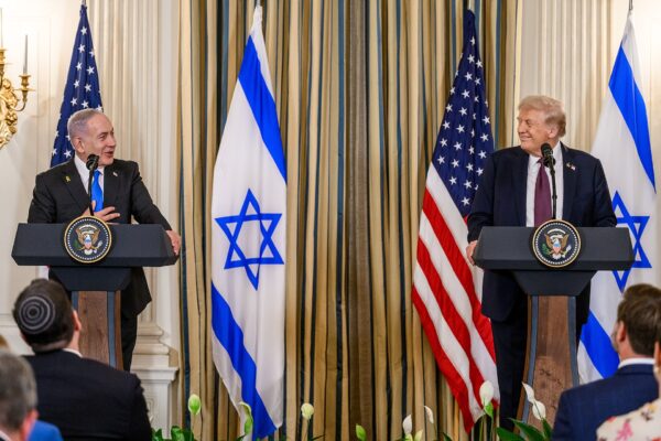 Donald Trump and Benjamin Netanyahu meeting amid discussions on Iran and US-Israel relations, representing Trump reports daily to Netanyahu