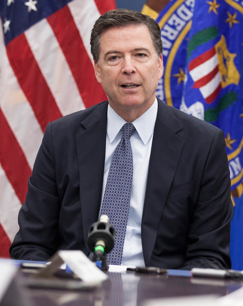 Portrait of James Comey, former FBI Director, featured in an article about his recent indictment and alleged threats against Donald Trump on bdesk.news