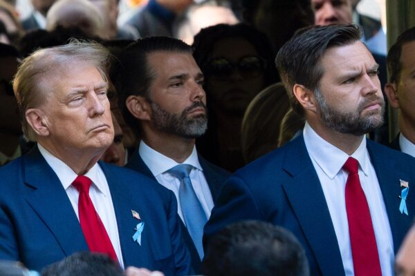 Donald Trump and JD Vance at a political event tied to Trump administration canceling Catholic Charities contract and federal funding cuts – bdesk.news